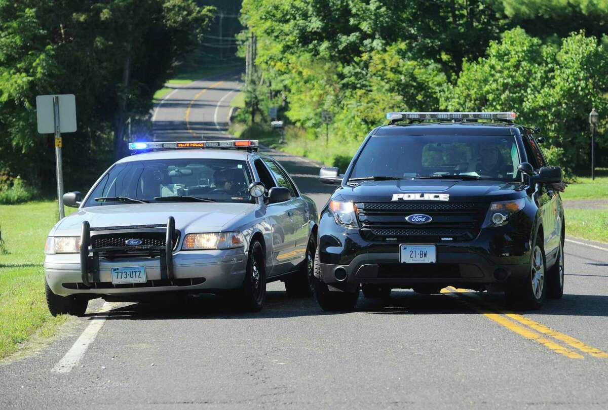 Two people were hospitalized Sunday after the motorcycle they were riding was struck by a car on Route 133 in Bridgewater, Conn.