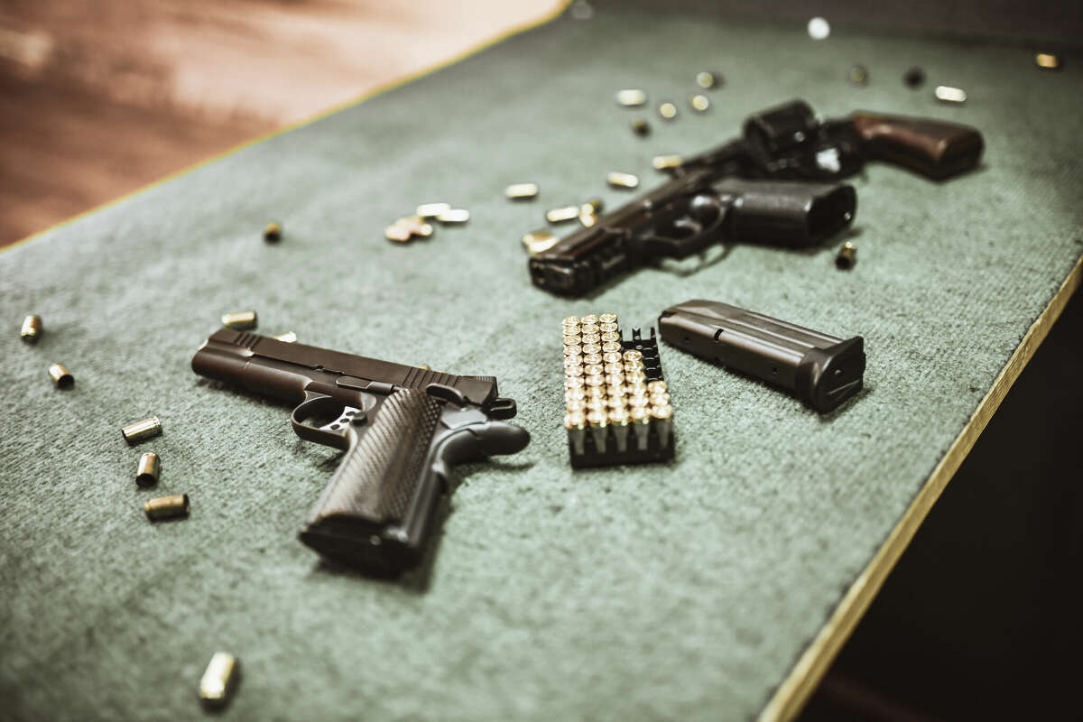 Modern Pistols And Gun Cartridges At Gun Training Range