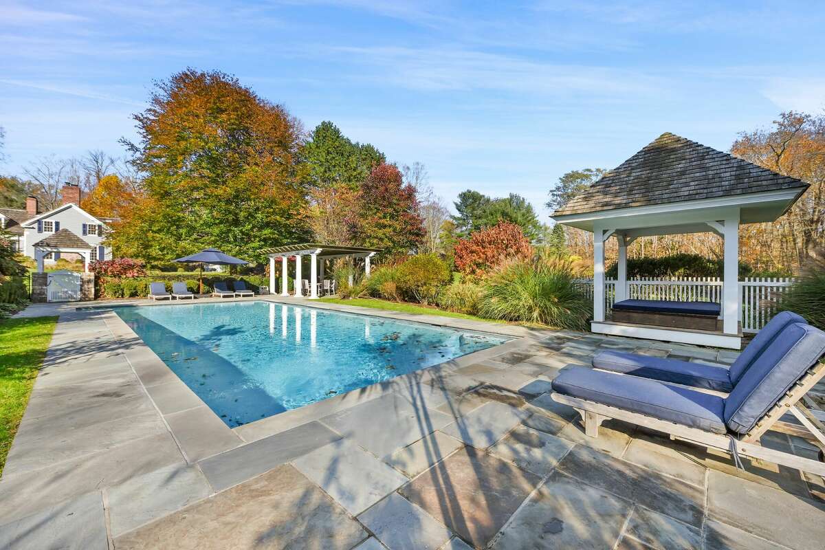 The pool and patio outside the main house on 241 Bedford Road in Greenwich, Conn.