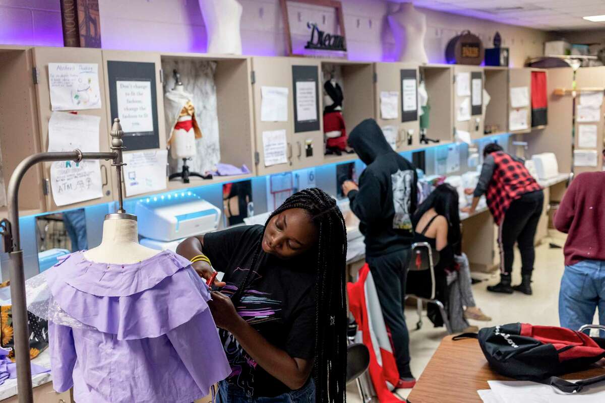 Kristina Thompson, 16, works her sewing project for the upcoming Fashion-Able fashion show at Wagner High School in San Antonio, Texas, is seen on April 21, 2022.