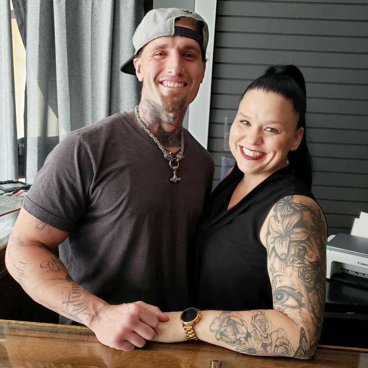 From left) Tattoo artist Brandon Mecam and Clean Lines Tattoo Company co-owner Kelly Stoudt opened their business in June 2021.