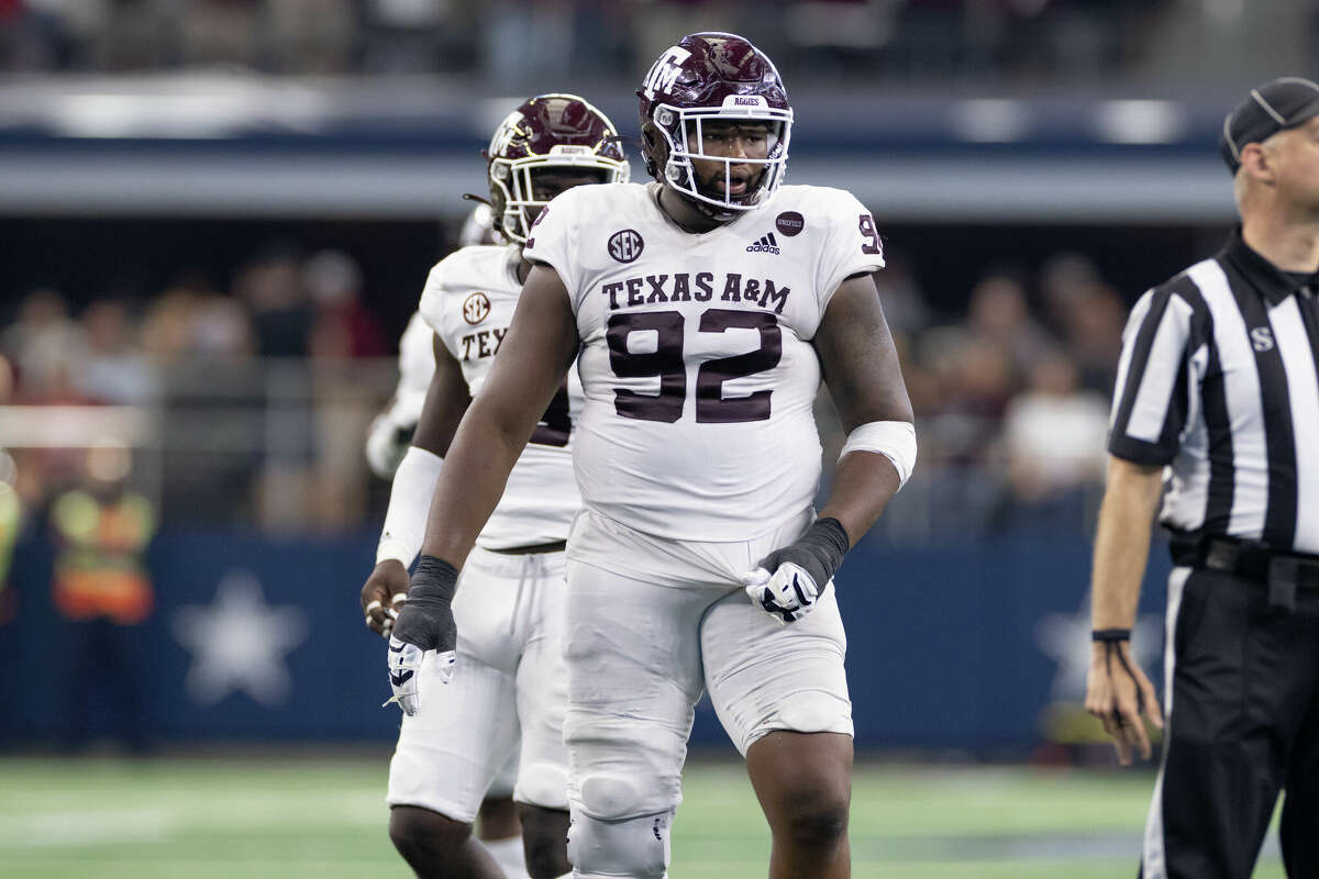 Texas A&M Aggies defensive lineman Jayden Peevy looks on during the Southwest Classic college football game between the Texas A&M Aggies and Arkansas Razorbacks on September 25, 2021 at AT&T Stadium in Arlington.