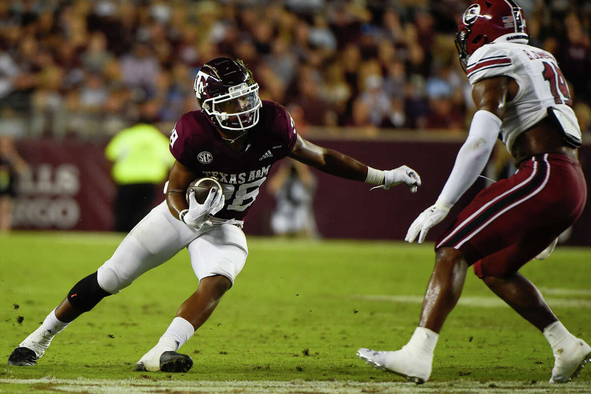 Texas A&M Aggies running back Isaiah Spiller (28) cuts back to the inside during a first half rushing attempt during the game between the South Carolina Gamecocks and the Texas A&M Aggies at Kyle Field on October 23, 2021 in College Station.