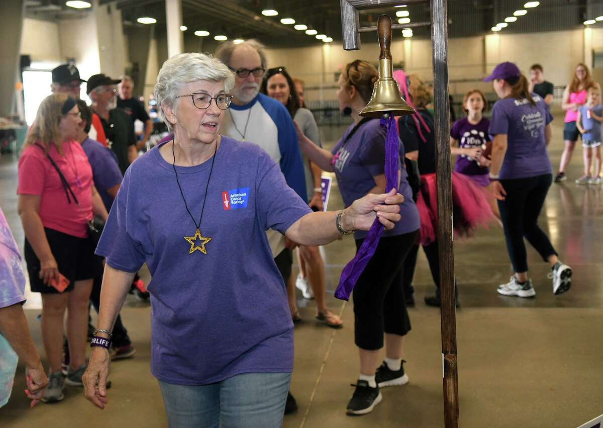 Shirley Bailey, a cancer survivor of Houston, rings the ceremonial bell during the survivor lap at the Relay For Life of Northwest Harris County at the Klein Multipurpose Center in Klein on Saturday, April 23, 2022. The event is a fundraiser for the American Cancer Society to celebrate survivors and remember those who have passed away.