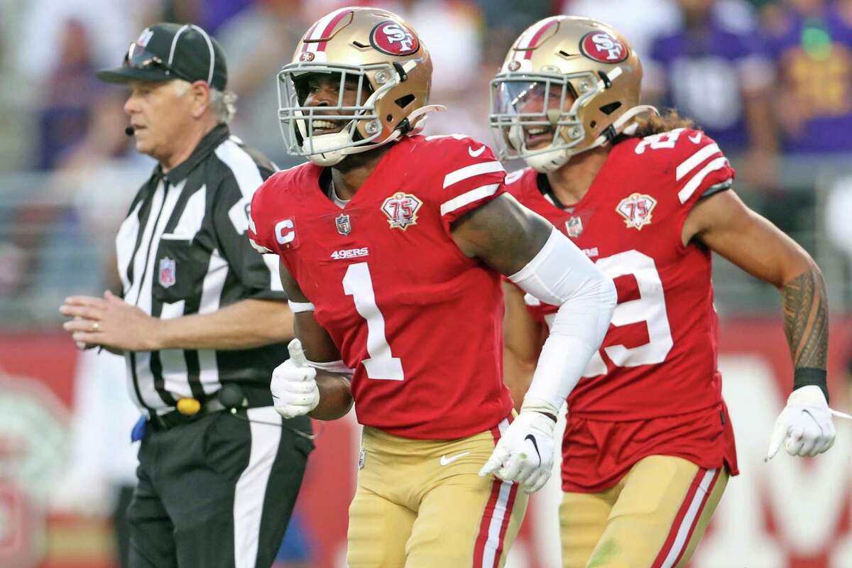 San Francisco 49ers' Jimmie Ward (1) and Talanoa Hufanga react to a defensive stop in 4th quarter of Niners' 34-26 win over Minnesota Vikings during NFL game at Levi's Stadium in Santa Clara, Calif., on Sunday, November 28, 2021.