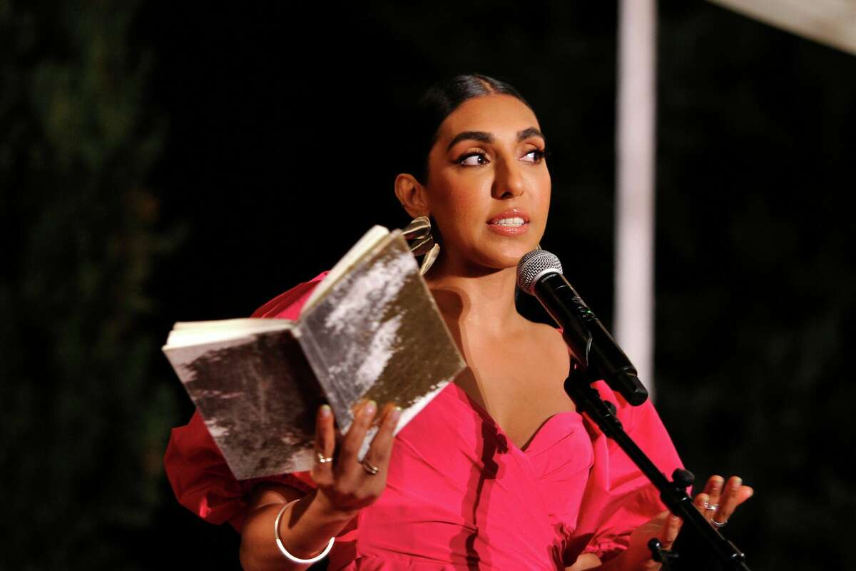 Poet Rupi Kaur performs at the Rupi Kaur World Tour Secret Show at The Fig House on April 12, 2022 in Los Angeles, California.