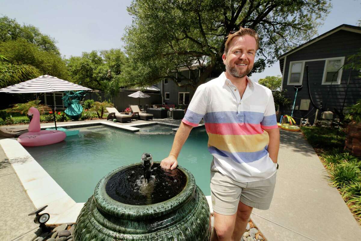 Homeowner Michael Kukuk at his backyard patio and pool, along with a clubhouse, that he rents out through Swimply, in his Eastwood neighborhood Monday, Apr. 18, 2022 in Houston, TX.