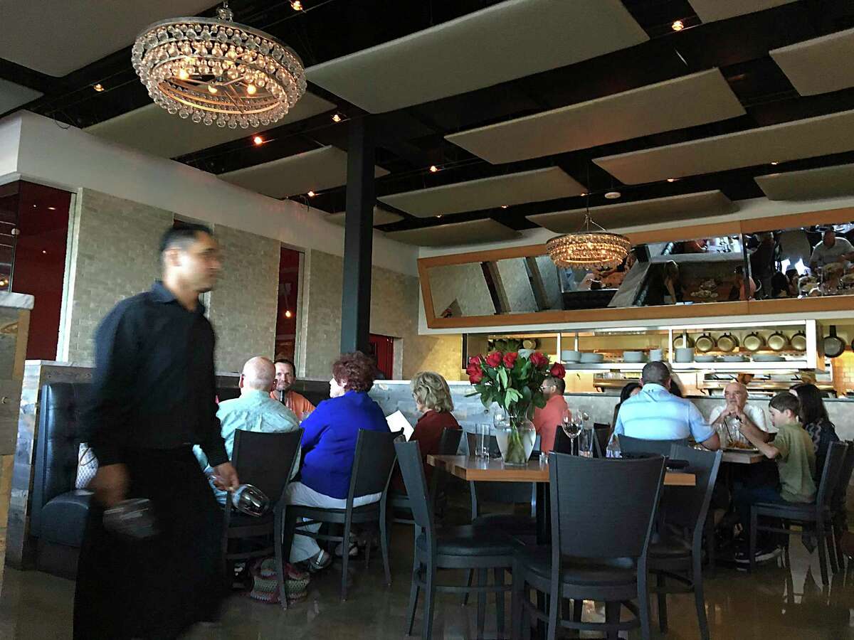 The dining room has a view of the kitchen at Silo Terrace Oyster Bar.
