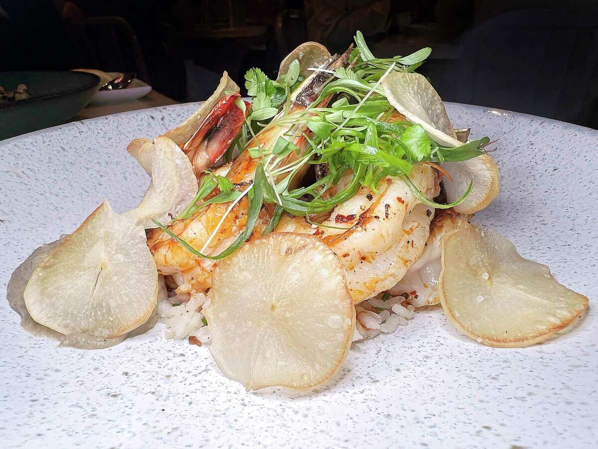 Gulf shrimp incorporates fried yuca, coconut rice, pureed sunchoke and chile oil at Clementine, the Southern-influenced restaurant from chefs John and Elise Russ in Castle Hills.