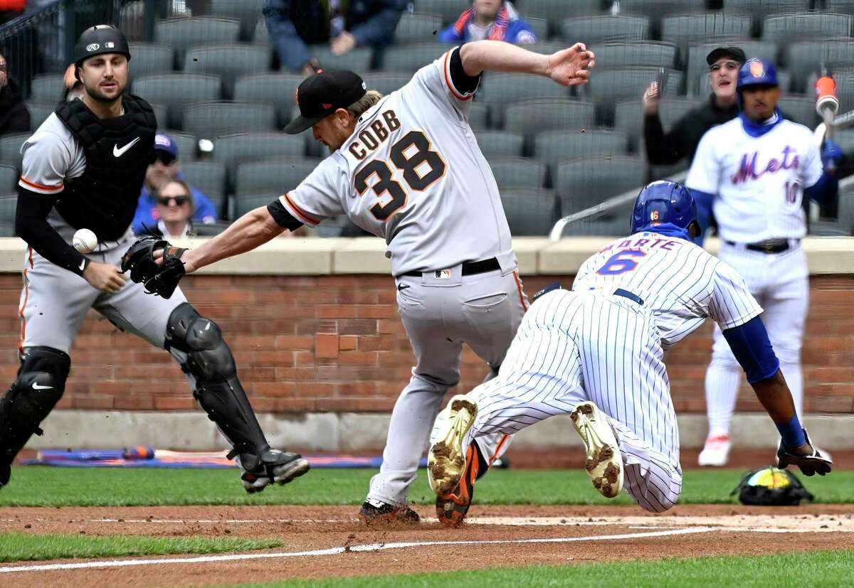 San Francisco Giants pitcher Alex Cobb progressing toward return. San Francisco Giants starting pitcher Alex Cobb, left, cannot handle the ball as New York Mets runner Starling Marte (6) scores on a wild pitch during the first inning of the first game of a baseball double-header Tuesday, April 19, 2022, in New York. (AP Photo/Bill Kostroun)