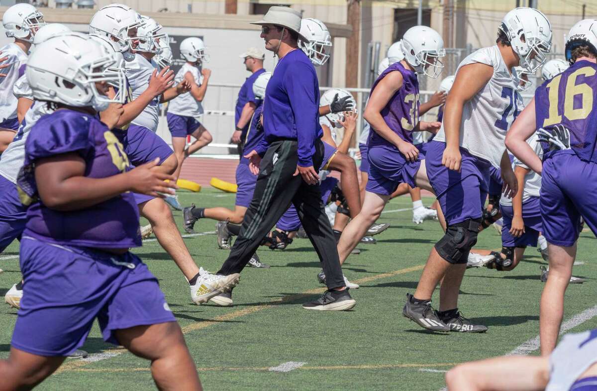 Midland High head coach Thad Fortune watches as his players as they run through drills 04/25/2020 during the first day of Spring practice at Memorial Stadium. Tim Fischer/Reporter-Telegram