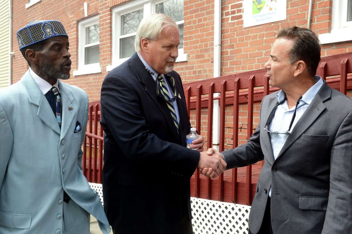 City Councilman Ernie Newton, Career Resources President Scott Wilderman, and Mayor Joe Ganim outside the new Bridgeport Reentry Welcome Center Monday.