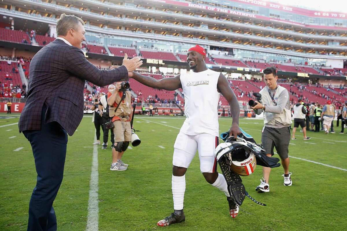 SANTA CLARA, CALIFORNIA - OCTOBER 27: San Francisco 49ers General Manager John Lynch congratulates Deebo Samuel #19 after a win against the Carolina Panthers at Levi's Stadium on October 27, 2019 in Santa Clara, California. (Photo by Lachlan Cunningham/Getty Images)
