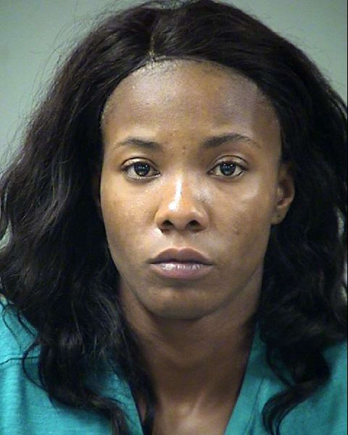 Enederia Cherelle Flowers, 22, is seen in a booking photo taken on Sept. 5, 2018. 