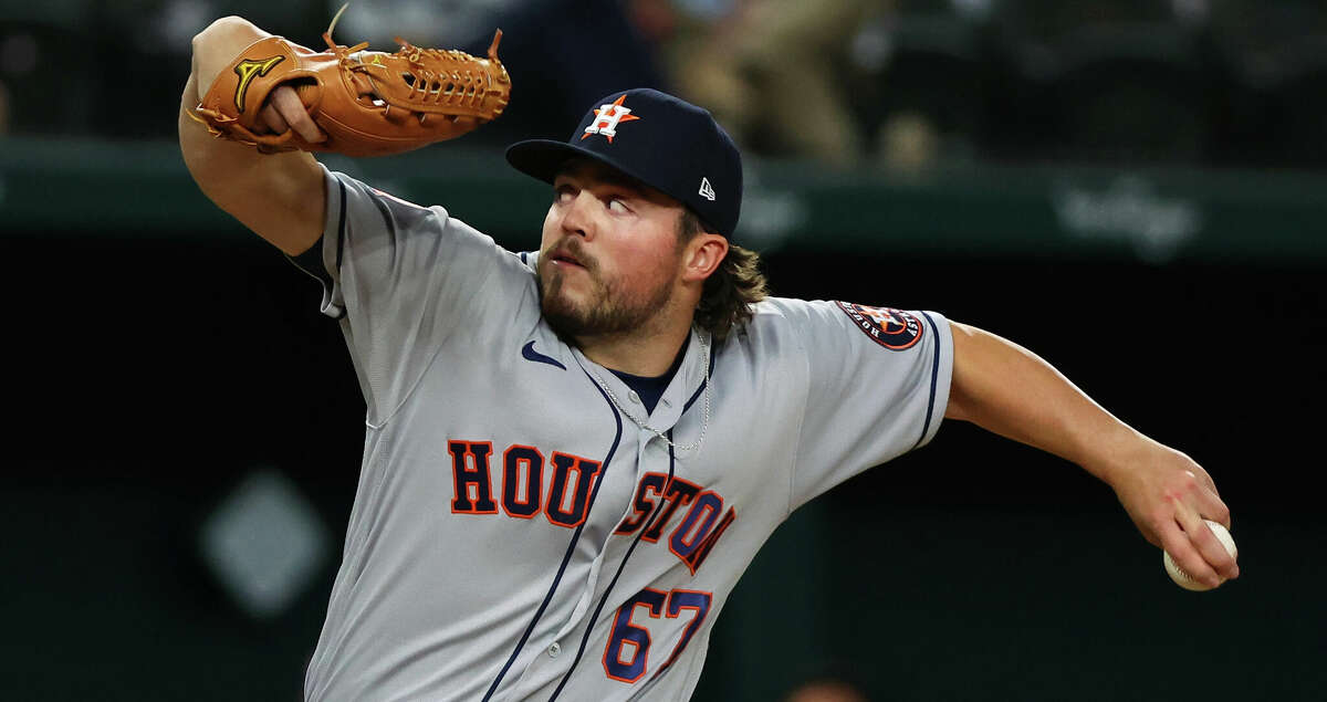 Parker Mushinski #67 of the Houston Astros pitches in the eighth inning against the Texas Rangers at Globe Life Field on April 25, 2022 in Arlington, Texas. (Photo by Richard Rodriguez/Getty Images)