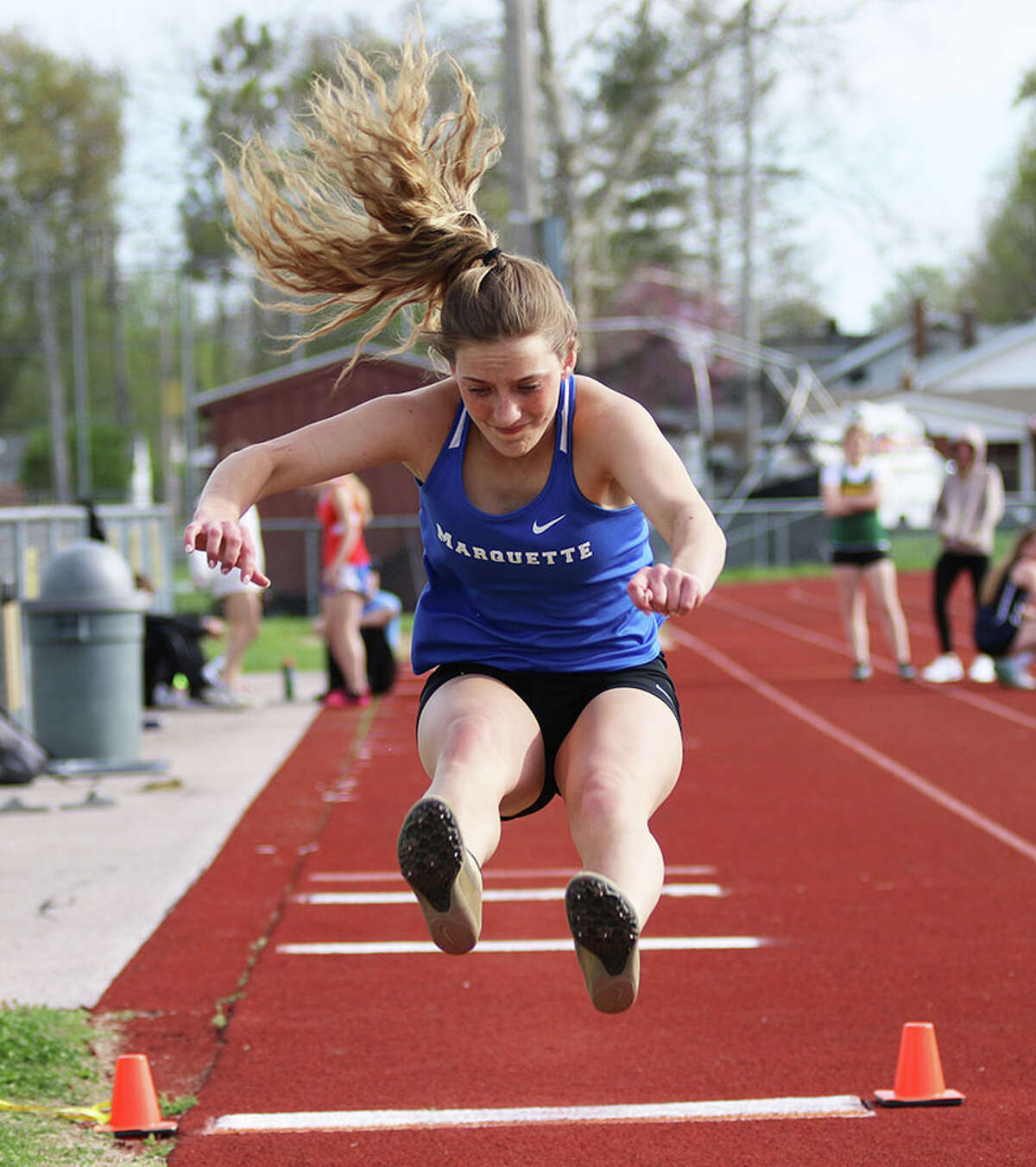 Marquette's Sammy Hentrich finished first in the long jump at Thursday's Staunton relays.