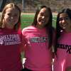 Greta Parkes, Mia Chen and Adriana Franzese captain Shelton's girls track team.