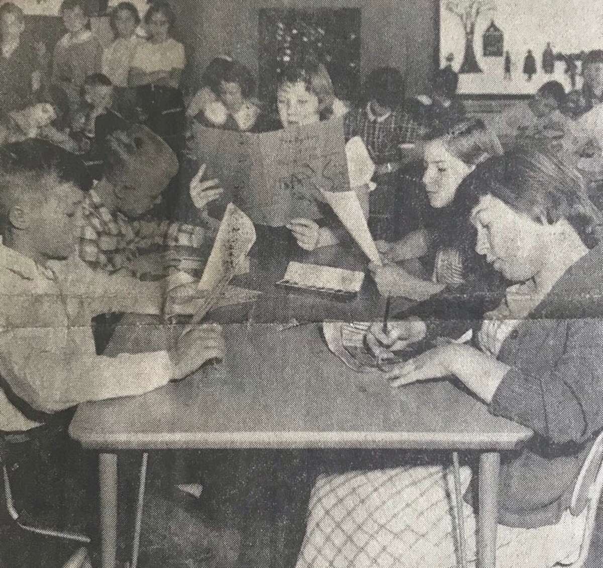 Fifth grade students in the Plymouth School classroom of Mrs. H.M. Varner spent six weeks writing the book, "Mystery of the Franklin Mansion." Working on the book, from left, Kennth Rowe, Douglas Parker, Judy Meeks, Lonnie Finney and Cleora Warner. December 1956