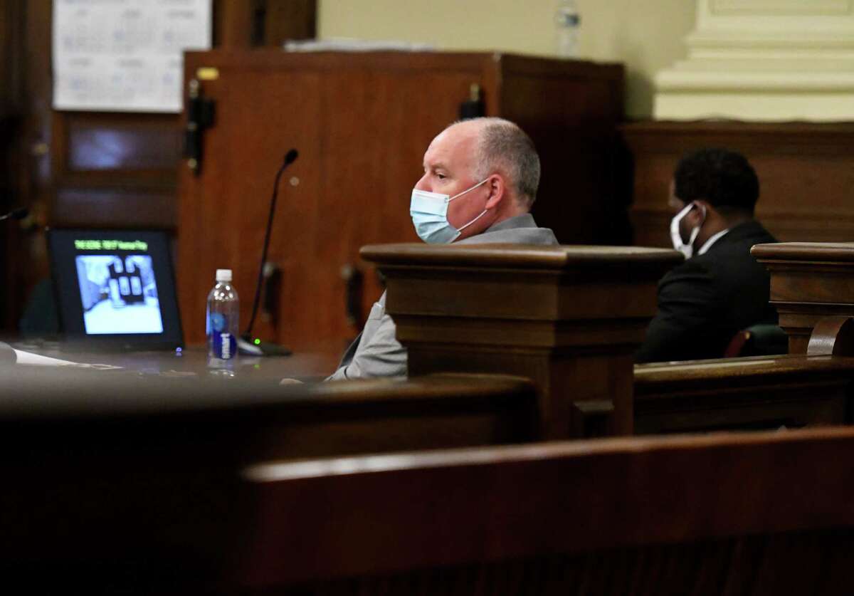 Defense attorney Robert Molloy, left, representing Kevin Cox, sits with his client, right, during closing arguments before Judge Debra Young on Tuesday, April 26, 2022, at the Rensselaer County Courthouse in Troy, N.Y. Cox is accused of killing his 6-year-old stepson, Davonte, after leaving him outside in frigid conditions.