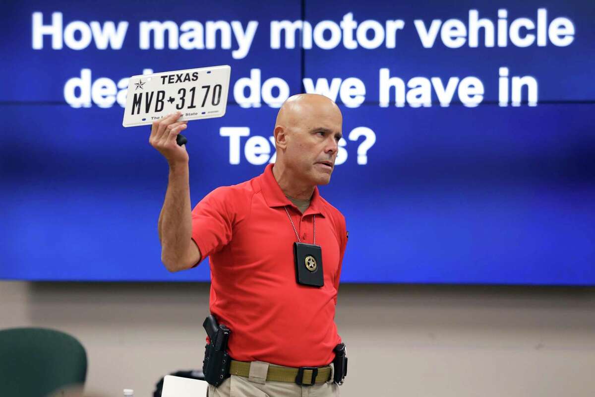 Travis County Precinct 3 Constable Det. Jose Escribano teaches a class for area law enforcement officers on fake paper license tags at the Woodlands Emergency Training Center on Sept. 24, 2021 in Conroe.