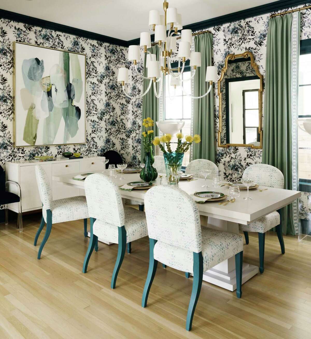 Interior designer Hallie Henley Sims approached the dining room in Julie Gimlett’s Woodland Heights home with layers of color and texture.