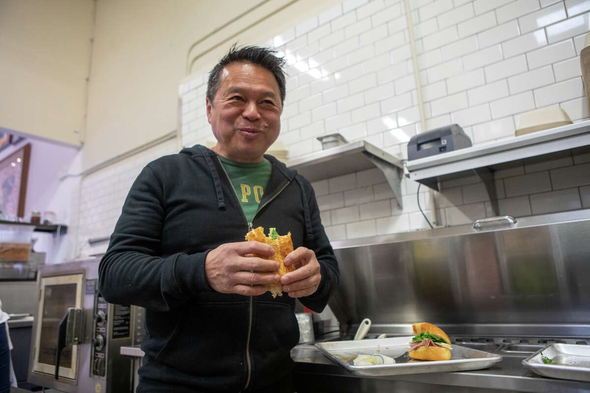 Chef Charles Phan takes a bite out of a CP?•s No. 3