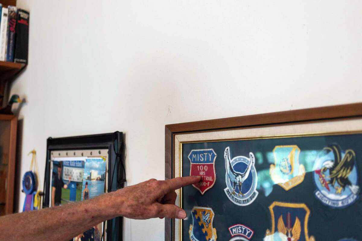 Vietnam War veteran Mike Hinkle shows off his Misty patch on display at his Fair Oaks Ranch home.