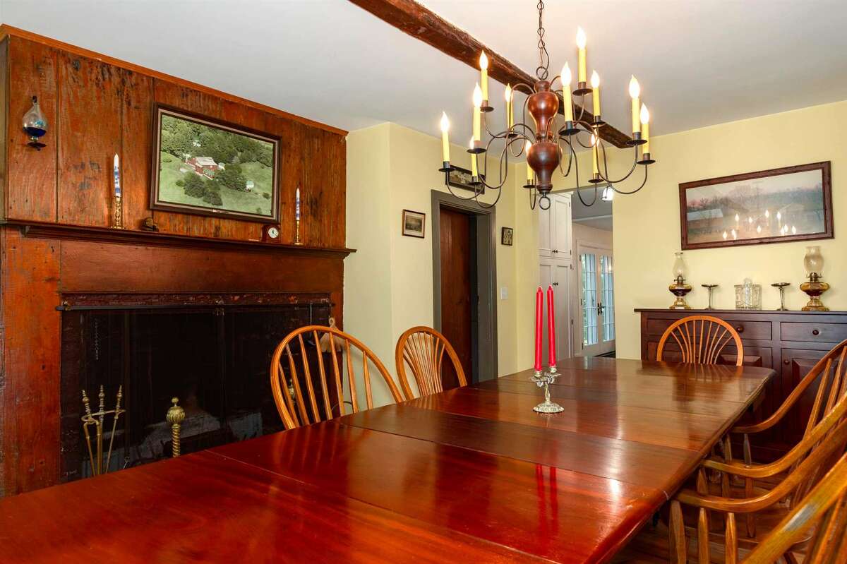 The 4,000-square-foot home includes a formal dining room and casual seating within the kitchen.