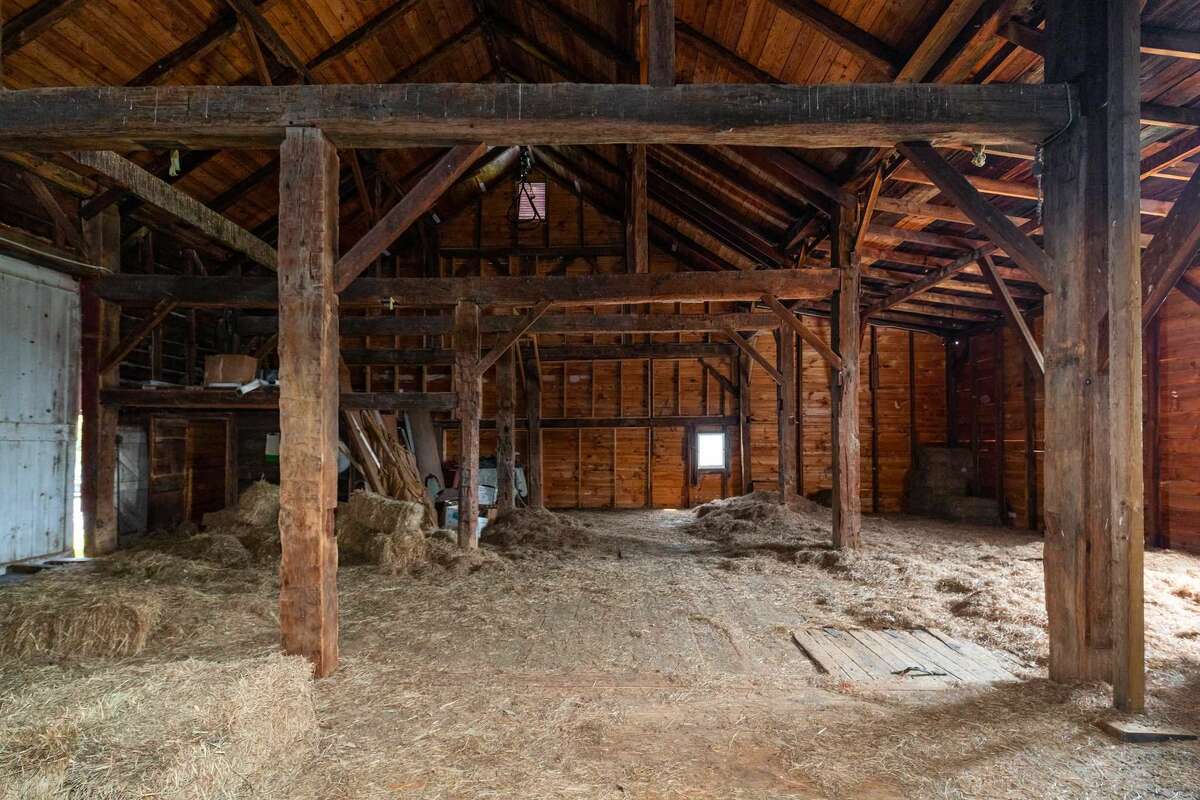 The property also includes 7,500 square-foot barn, as well as a chicken coop, workshop, horse barn and 4-bay garage.