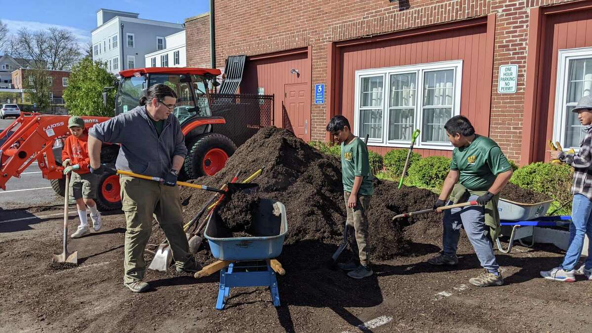 Scouts cleaned up Main Street on Saturday, April 23 in honor of Ryan Adams, a Ridgefield Eagle Scout who died at 18 in a plane crash. From left to right: Dan Laub (adult leader Troop 116), Adithya Arun, and Ben Macaraeg.