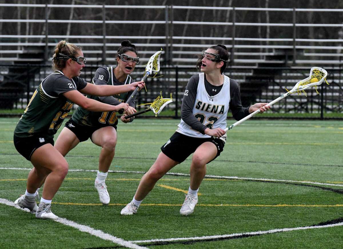 Siena women’s lacrosse player Mary Soures, right, seen in 2022, led Siena with five goals an assist on Sunday but the Saints lost, 13-11 to Pittsburgh of the ACC at Hickey Field in Loudonville.