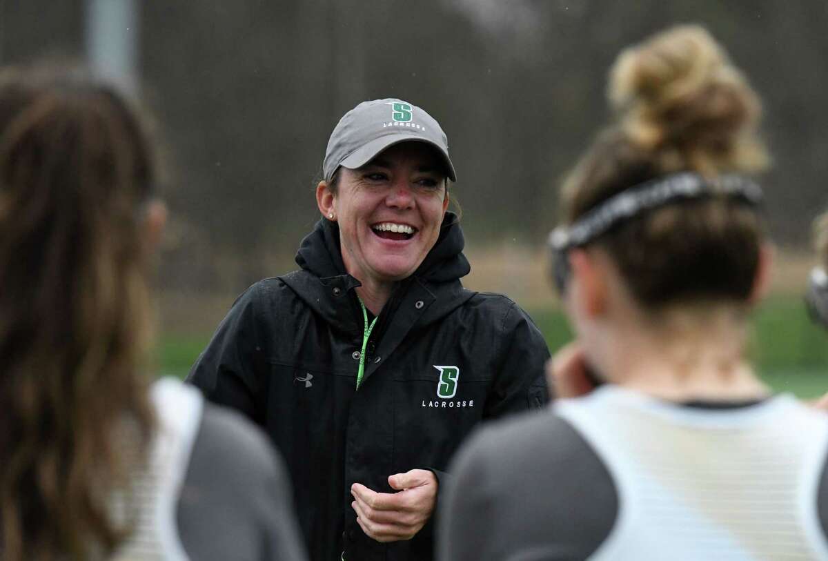 Siena women’s lacrosse head coach Abby Rehfuss works with players during a practice session on Tuesday, April 26, 2022, at Siena College in Colonie, N.Y.