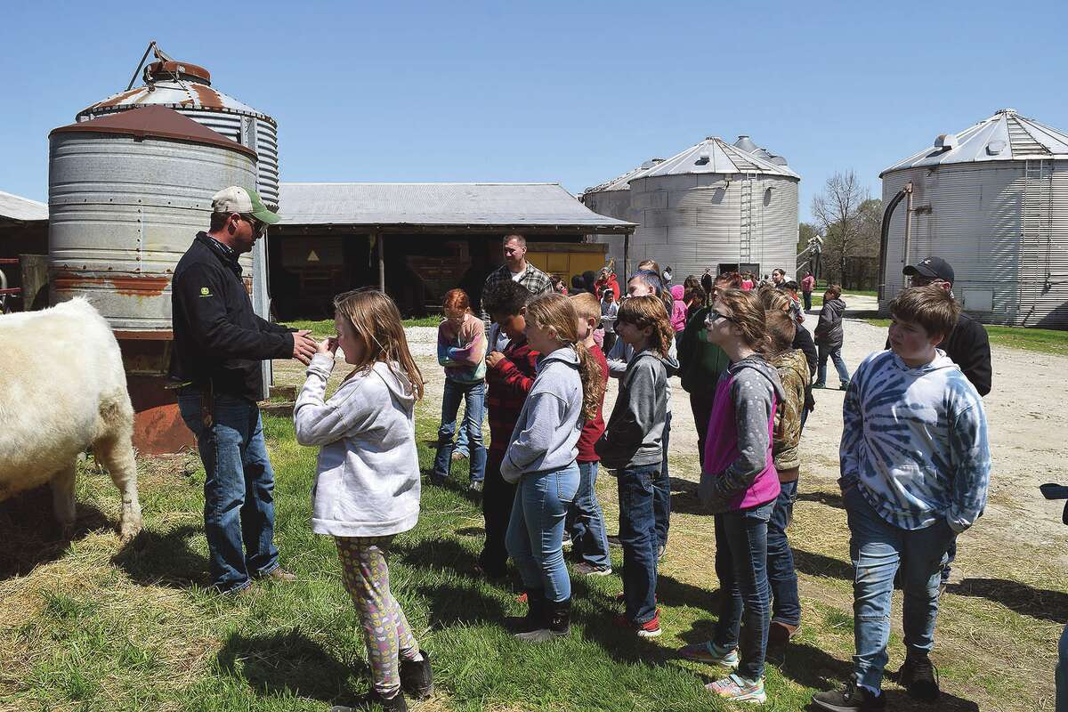 Area fourth grade students learn about the farm Tuesday.
