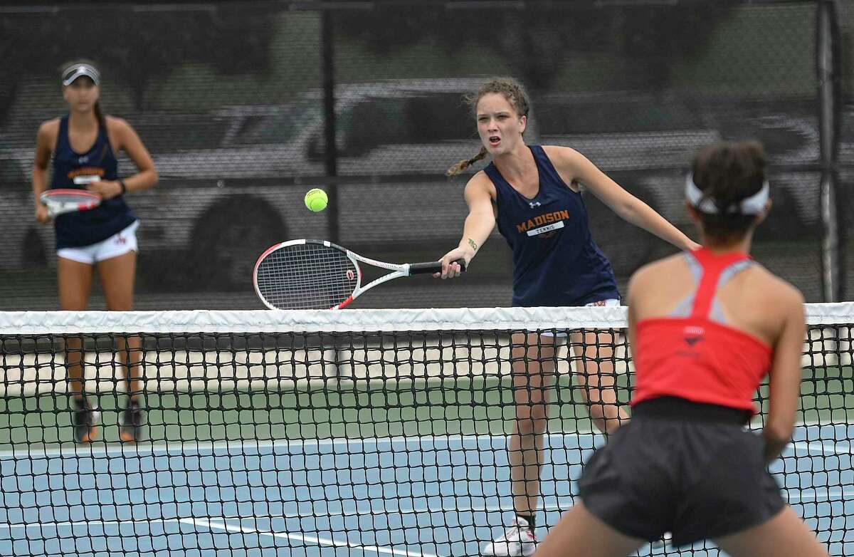 Mattea Bowe returns a shot as she and her sister and doubles partner, Mya, defeat Hallie Jeffers and Rashmi Singal of Houston Memorial during the quarterfinals round of the UIL state tennis tournament at the Northside Tennis Center on Tuesday, April 26, 2022.
