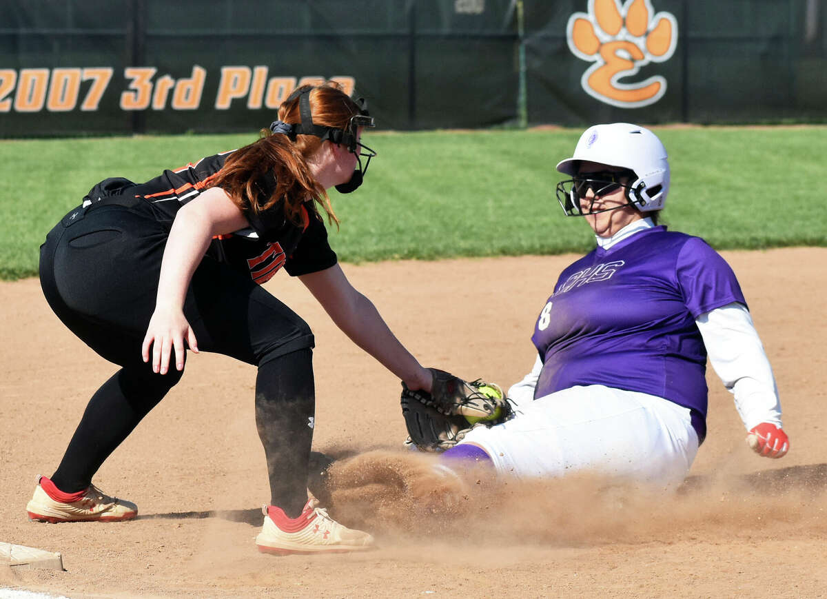 Edwardsville's Brooke Tolle tags out a runner against Collinsville on Tuesday inside the District 7 Sports Complex in Edwardsville.