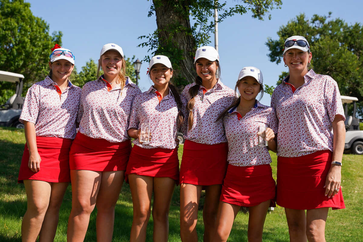 The Midland Christian girls golf team poses after qualifying for the state tournament with a fourth place finish at the TAPPS 6A North Zone Region in Carrolton on 4/26/2022. 