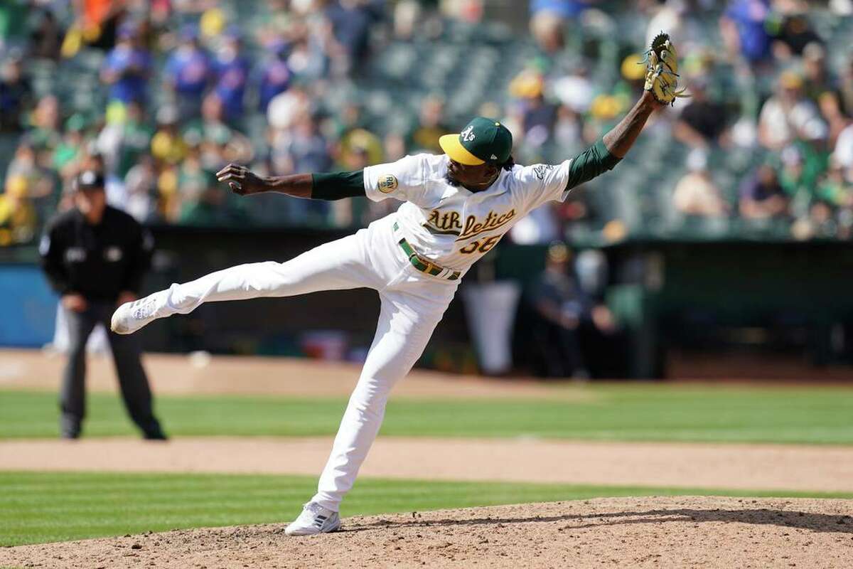 Oakland Athletics pitcher Dany Jimenez against the Texas Rangers during a baseball game in Oakland, Calif., Sunday, April 24, 2022. (AP Photo/Jeff Chiu)