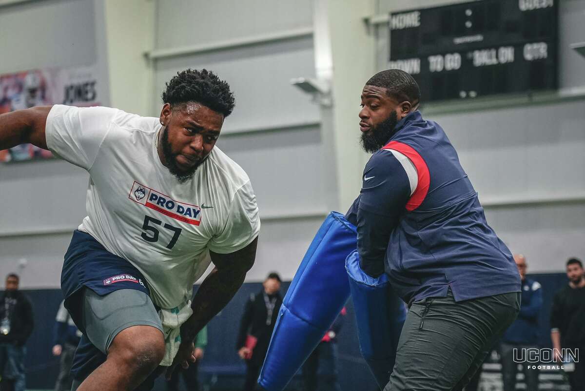 Defensive tackle Travis Jones works out for NFL scouts during UConn football’s pro day at the Shenkman Training Center on March 23. Jones, a New Haven native, could become the first Wilbur Cross alum to be drafted.
