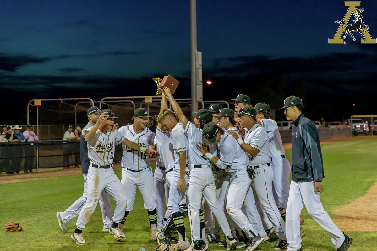 The Andrews baseball team celebrates after winning the District 2-4A title with a 10-0 record following a 15-0 shutout of Pecos on April 26. 