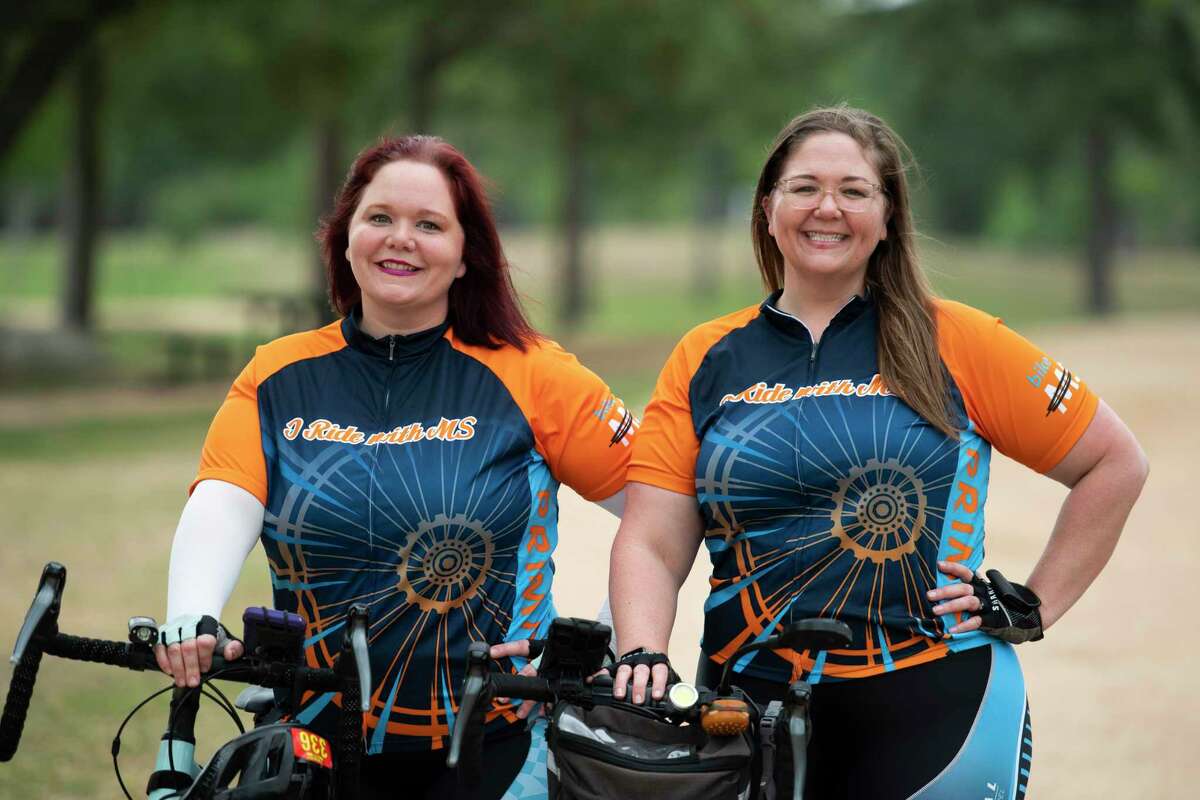 Jennie Hemphill, left, and Karen Adewale stand with their bikes at MaryJo Peckham Park Saturday, April 16, 2022, in Katy, Texas.