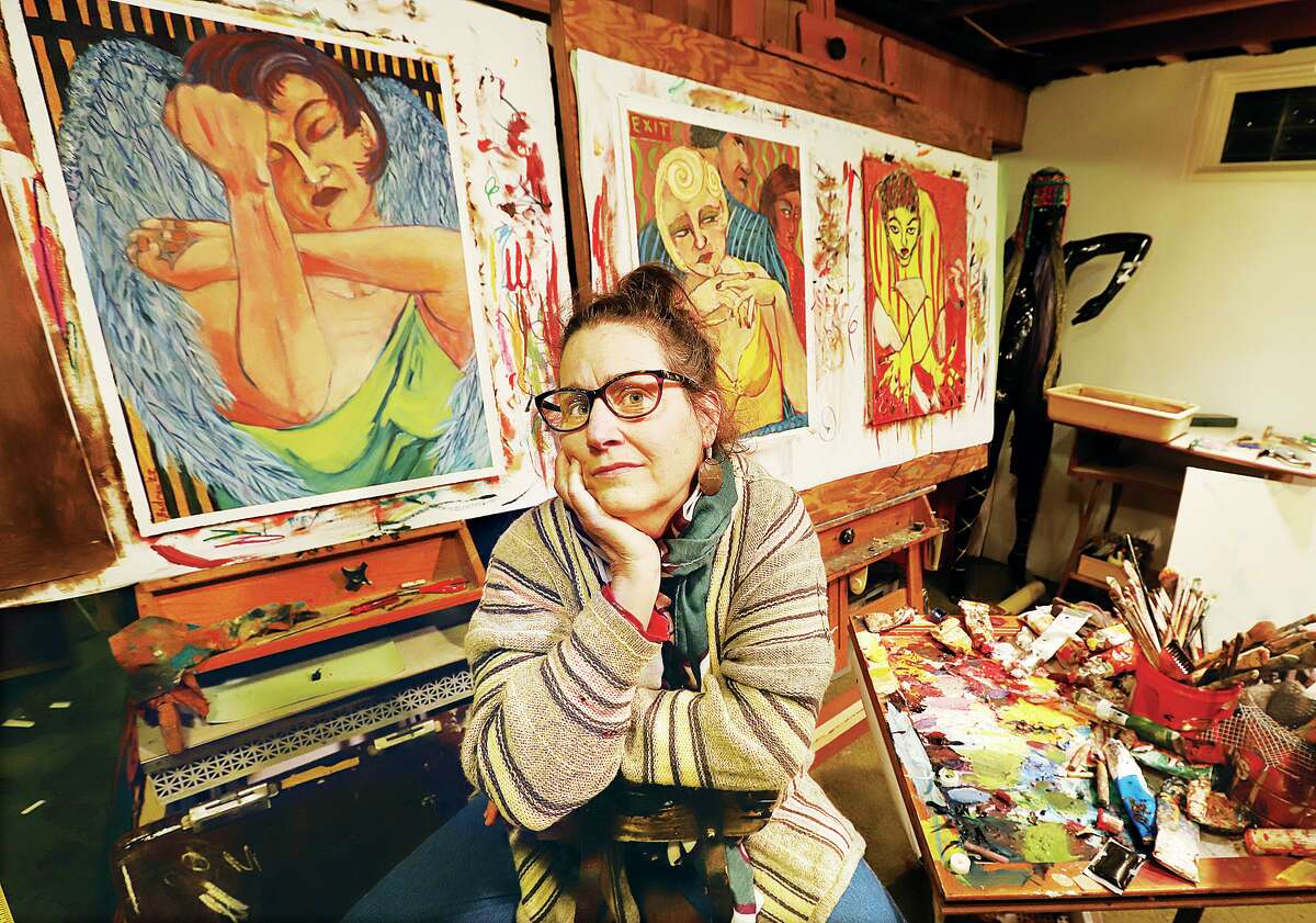 Alton artist Patricia Badman in her studio with some of the works that will be on display Thursday at Kooliverse Couture Night at The Conservatory, 554 East Broadway in Alton. Badman's work will on display with work from artists Amy Mareing and Suzy Farren during a meet the artists night, from 6-8 p.m. Thursday.