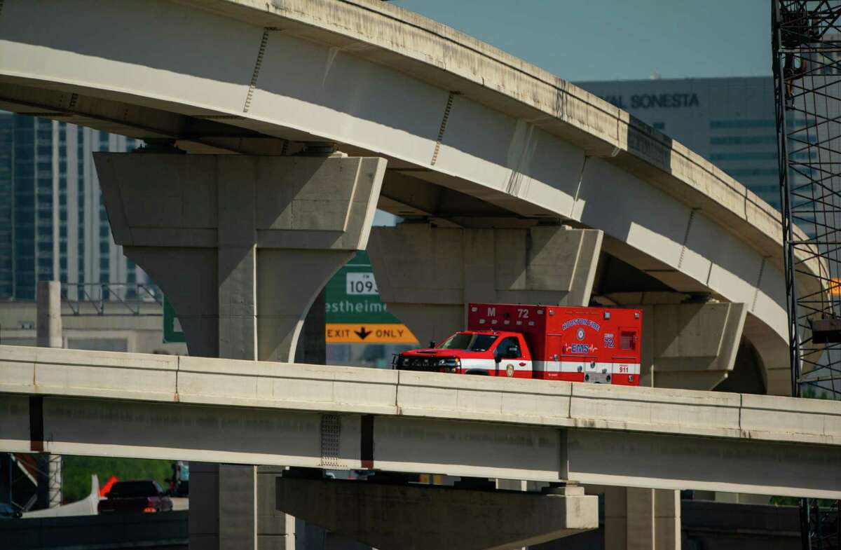 An ambulance drives on the southbound ramp from Interstate 69 to southbound Loop 610, on Wednesday, April 27, 2022, in Houston. The ramp will be shut down for the next two years starting on Friday to allow construction to continue.