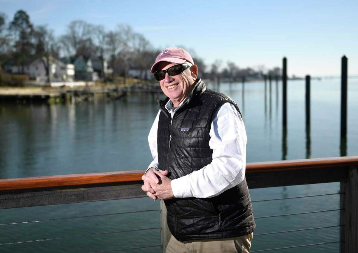 David Tunick poses at the Stamford Yacht Club in Stamford, Connecticut on Monday, Feb. 21, 2022. The 78-year-old intends to embark on an approximately 5,000 nautical mile voyage from Spain to Connecticut on his personal sailboat in May.