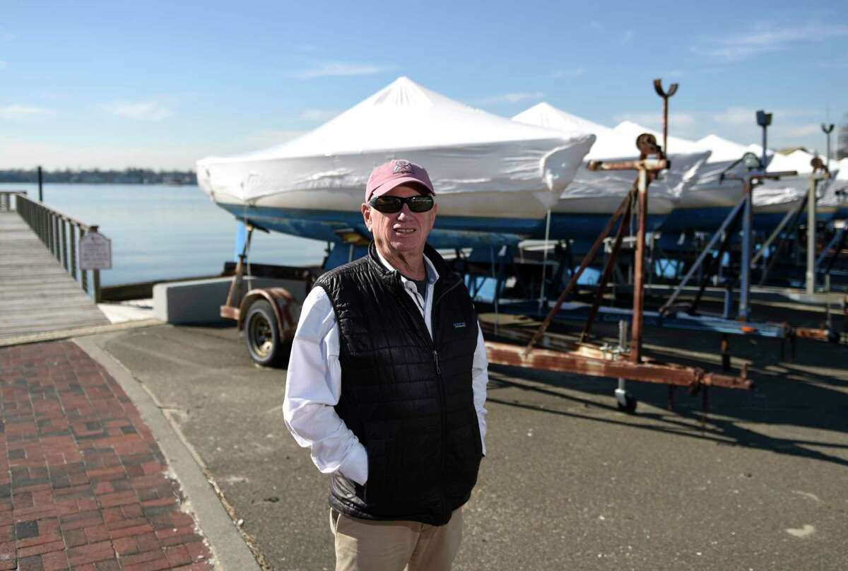 David Tunick poses at the Stamford Yacht Club in Stamford, Connecticut on Monday, Feb. 21, 2022. The 78-year-old intends to embark on an approximately 5,000 nautical mile voyage from Spain to Connecticut on his personal sailboat in May.