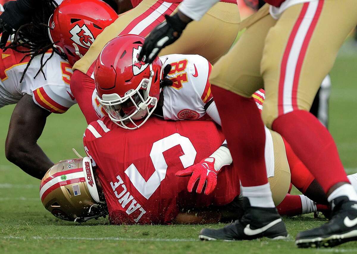 San Francisco 49ers could opt for Trey Lance protection at NFL Draft. Trey Lance (5) sacked by Omari Cobb (48) in the first half as the San Francisco 49ers played the Kansas City Chiefs at Levi’s Stadium in Santa Clara, Calif., on Saturday, August 14, 2021.