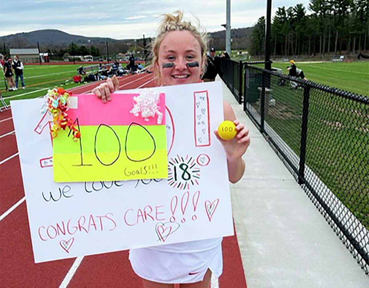 Caroline Colton of Somers scored her 100th career goal during a 10-10 double overtime tie with East Catholic on Thursday, April 21, 2022.