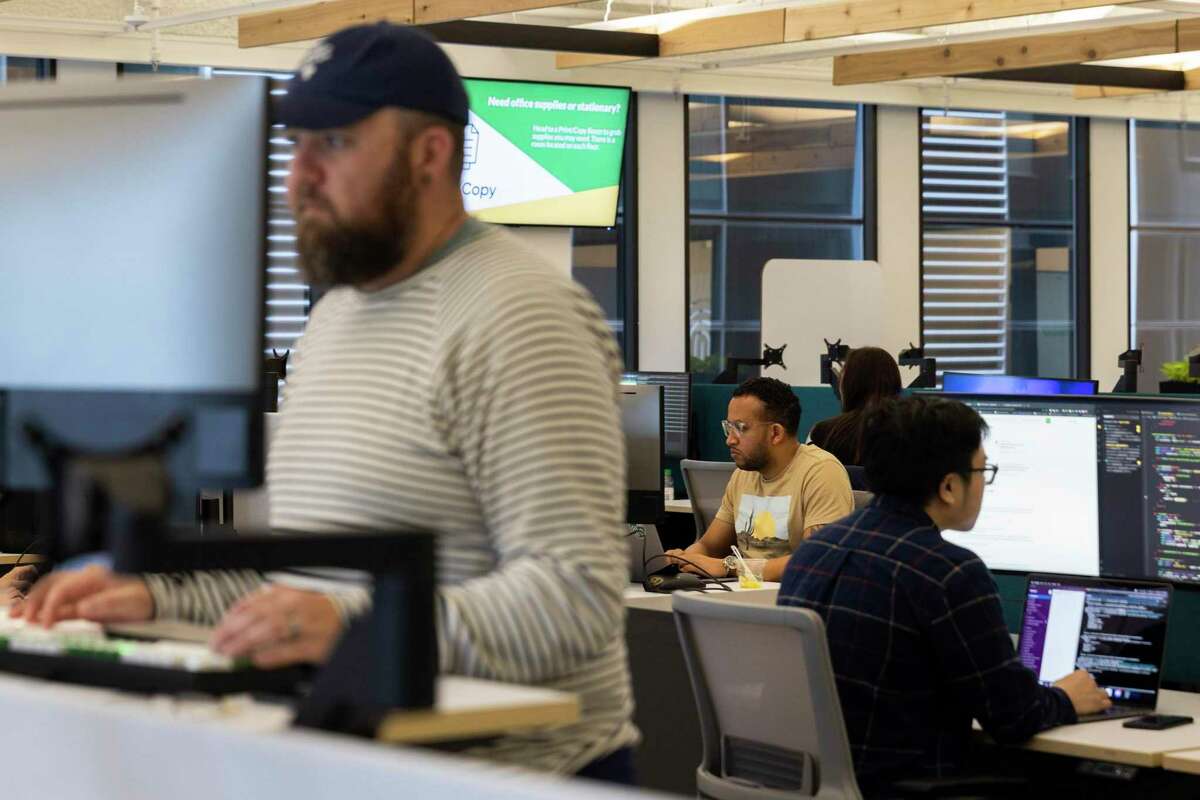 Though Glassdoor’s office has fewer rows of desks than it used to, employees can still work in the company’s new San Francisco office.