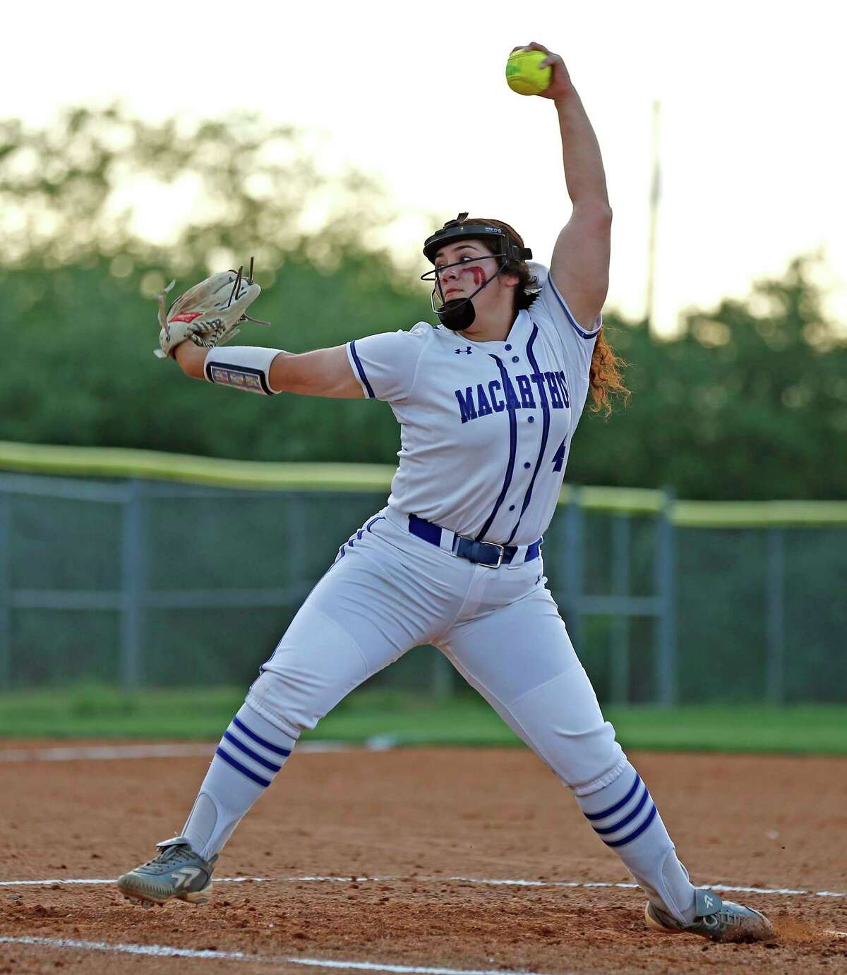 MacArthur pitcher Madison Collins (4) delivers a pitch in a HS Softball Playoffs game where MacArthur defeated Clemens 11-1 on Wednesday, April 27, 2022 at Blossom Athletic Field.