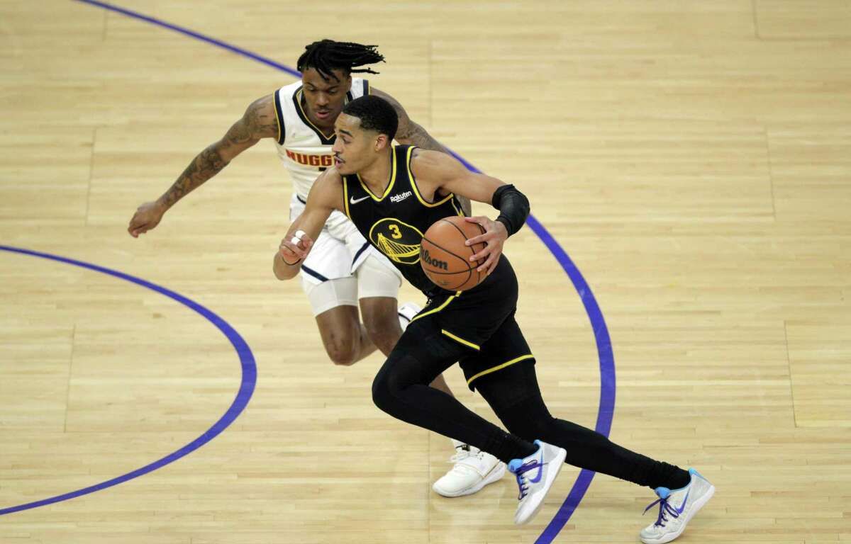 Jordan Poole (3) drives to the basket in the first half as the Golden State Warriors take on the Denver Nuggets in Game 5 of the NBA Playoffs first round at Chase Center in San Francisco, Calif. on Wednesday, April 27, 2022 .