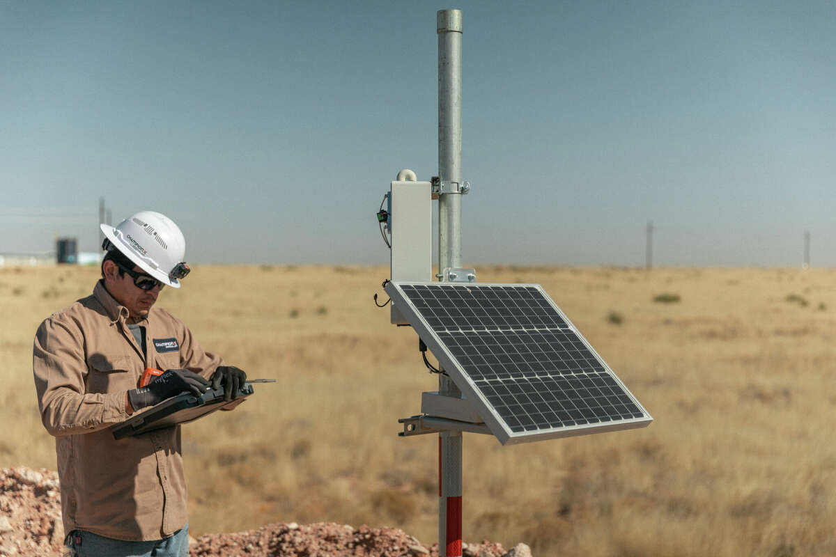 A ChampionX technician inspects one of the SOOFIE fixed continuous monitoring systems at an ExxonMobil Poker Lake, New Mexico facility. ExxonMobil’s extensive multi-tiered technology approach to methane monitoring and mitigation at its Poker Lake operations is key to the company receiving the highest certification grade, grade A, from MiQ.